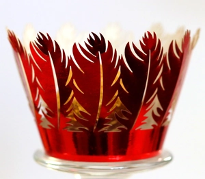 Laser-cut red feather cupcake wrappers with shiny metallic finish for holiday decoration
