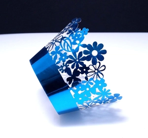 Lace hollowed out cupcake wrappers with navy blue metallic floral laser-cut design