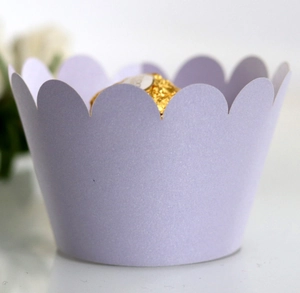 Close-up of lavender scalloped cupcake wrapper with pearlescent finish for desserts