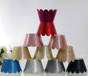Sparkly glitter cupcake wrappers with wave edges in various colors for baking decor