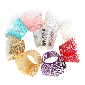 Laser cut leaf cupcake liners in various colors including gold silver and blue