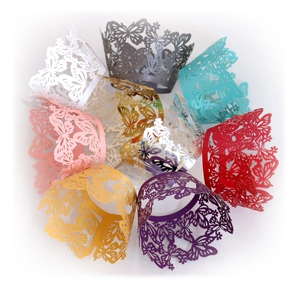 Lace-cut butterfly cupcake wrappers in multiple vibrant colors for party decorations