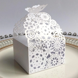Laser-cut white butterfly candy box with floral hollow patterns for wedding party favors