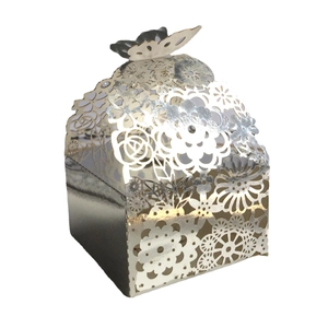 Laser-cut silver wedding candy box with butterfly clasp and floral hollow design