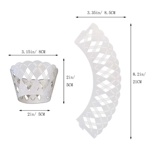 Macro view of white laser-cut cupcake wrappers with diamond lattice and dot texture detail