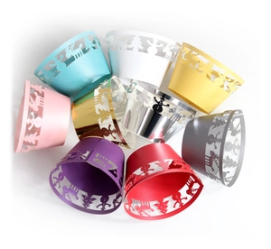 Laser-cut Christmas cupcake wrappers with tree, snowman and deer designs in 8 colors