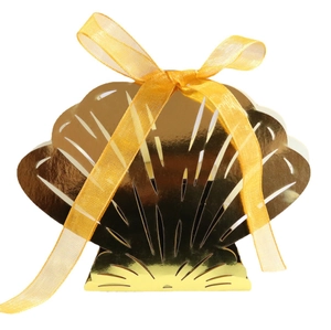 Golden seashell candy gift box made of mirror cardstock with a yellow ribbon bow