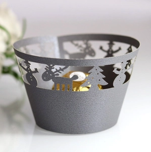 Laser-cut silver Christmas cupcake wrapper with reindeer and snowman silhouettes