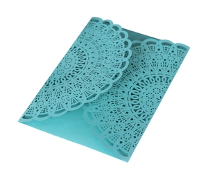 Intricate laser-cut cyan blue wedding invitation cover with radial lace floral pattern