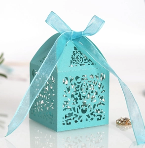 Detailed laser-cut floral pattern on Tiffany blue cardstock wedding favor box