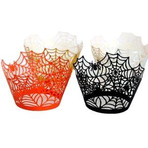 Laser-cut Halloween cupcake wrappers with spider web design in black, orange, and gold