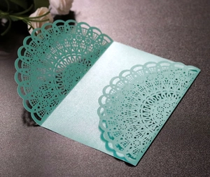 Laser cut hollow wedding invitation card in mint green pearlescent paper