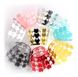 Laser-cut heart-shaped cupcake wrappers in various vibrant colors for decorative baking