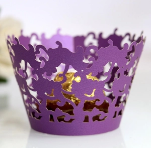 Purple laser cut lace cupcake wrappers with elegant filigree design and pearlescent finish