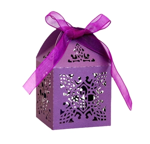 Detailed laser-cut purple gift box with hollow patterns and a silk ribbon bow