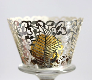 Silver laser-cut cupcake wrappers with leaf vein pattern for wedding party decor