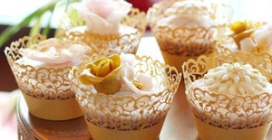 Lace laser-cut cupcake wrappers with vine floral patterns for elegant dessert decoration