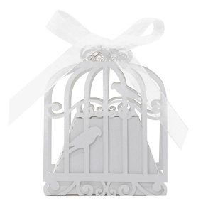 Detailed laser-cut wedding favor box in white birdcage shape with silk ribbon bow
