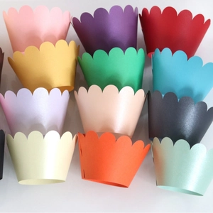 Set of scalloped cupcake liners in 12 pearlescent colors including gold and pink