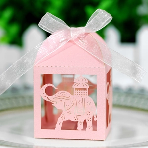Pink laser-cut elephant favor box with white ribbon for weddings and parties