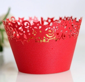 Red hollow laser-cut star pattern cupcake wrappers with pearl finish for party decoration