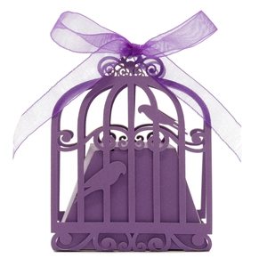 Detailed laser-cut purple birdcage candy box with elegant ribbon for wedding favors