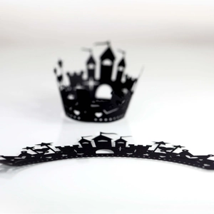 Black laser-cut castle silhouette cupcake wrappers for Halloween or themed party decor