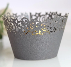 Silver hollow star laser-cut cupcake wrappers with elegant pearlescent finish