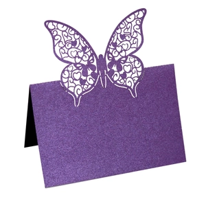 Purple laser cut butterfly place card with heart patterns for wedding table decor