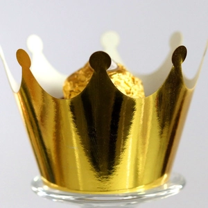Golden crown paper cupcake wrapper with elegant laser cut edge and chocolate display