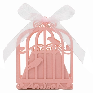 Detailed laser-cut pink wedding favor box with birdcage motif and white ribbon bow