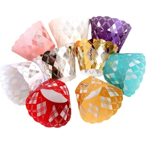 Laser cut hollow cupcake liners with diamond pattern and scalloped petal edges in multi-colors