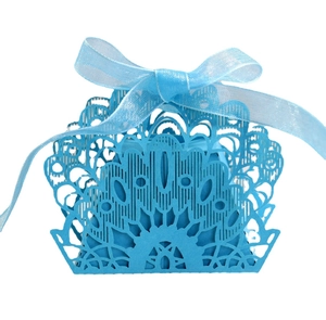 Sky blue laser-cut wedding candy box with elegant lace pattern and matching ribbon bow