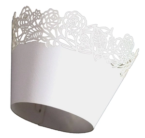 Detailed laser-cut hollow rose pattern on white pearlescent paper cupcake wrapper