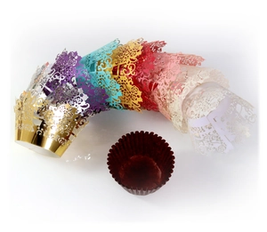 Laser cut hollow paper cupcake wrappers with rose petal patterns in various colors