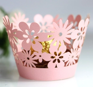 Pink laser cut flower cupcake wrappers for wedding decorations and party supplies