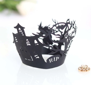 Laser-cut Halloween cupcake wrapper featuring black castle, bat, and RIP tombstone patterns