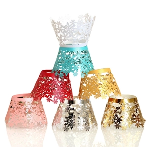 Laser cut snowflake cupcake wrappers in multiple colors for festive party decoration