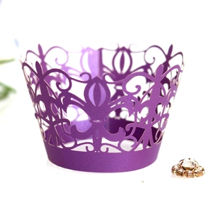 Detailed laser-cut purple pearl paper cupcake wrapper with elegant European scroll patterns