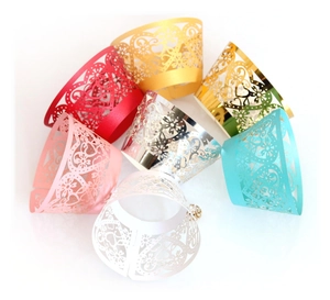 Laser-cut heart pattern cupcake wrappers in multiple metallic colors for wedding decoration