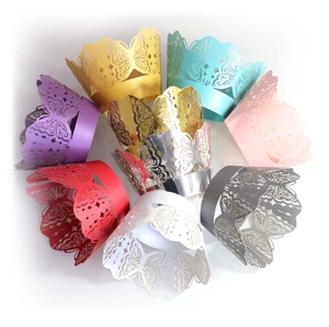 Laser cut butterfly cupcake wrappers in multiple colors for party baking decoration