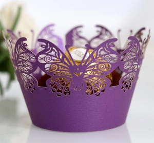 Elegant purple laser-cut butterfly cupcake wrappers for wedding and party decorations