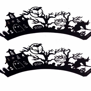 Halloween cupcake wrappers featuring black silhouettes of haunted castles and witches
