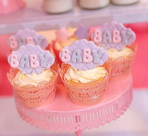 Pink lace cupcake liners and BABY letter toppers for baby shower party decorations