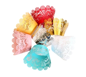 Laser cut lace cupcake wrappers in multiple metallic colors for wedding party decoration