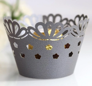 Laser-cut grey crown pattern cupcake liners with elegant hollow floral paper design