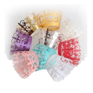 Laser-cut lace cupcake wrappers in multiple metallic colors for party cake decoration
