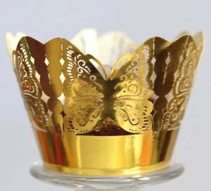 Elegant gold laser-cut butterfly cupcake wrappers for wedding cake decoration