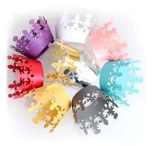 Laser cut hollow crown cupcake wrappers in multiple vibrant colors for dessert decoration