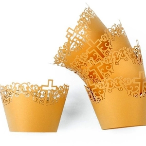 Golden laser-cut lace cupcake wrappers with elegant cross design for baptism and wedding